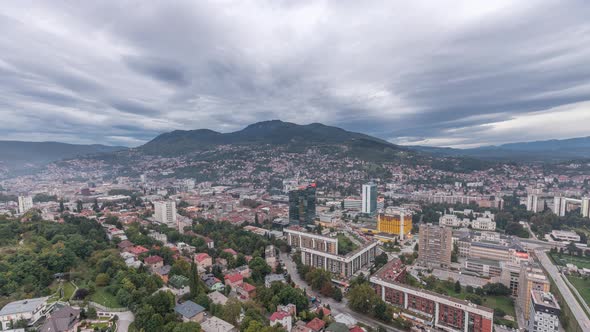 Aerial view of the southern part of Sarajevo city day to night timelapse