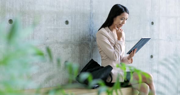 Business woman using tablet computer