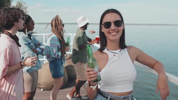 Girl with Beer on Pier Party