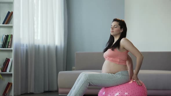 Pregnant Woman Giving Advices on How to Prepare Herself for Childbirth at Home