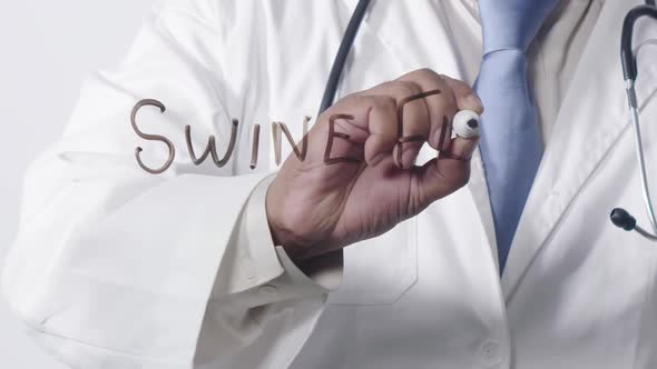 Asian Doctor Writing Swine Flu