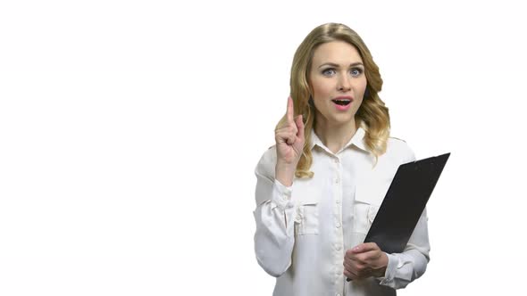 Portrait of Young Surprised Business Woman Having an Idea