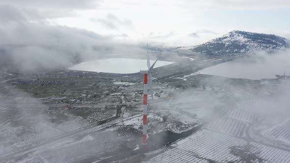 Grape vines under heavy snow In a vast vineyard, Aerial view.