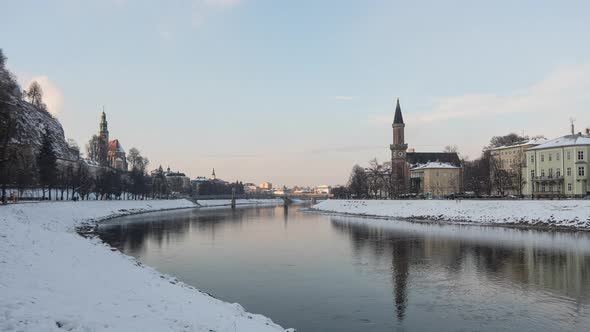 Timelapse of the Salzach River and buildings