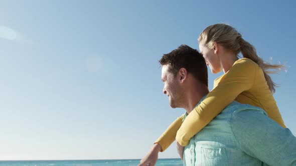 Couple in love enjoying free time on the beach together