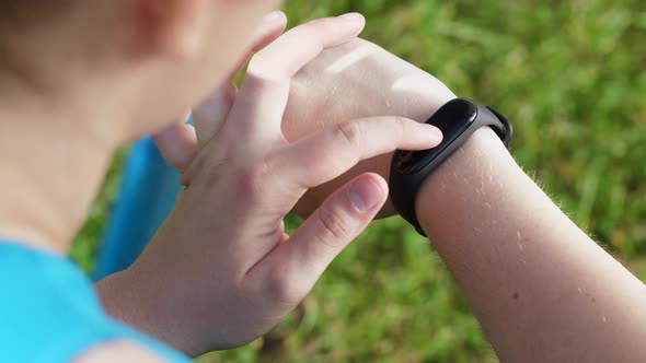 Hand of Fat Woman Runner with Fitness Bracelet