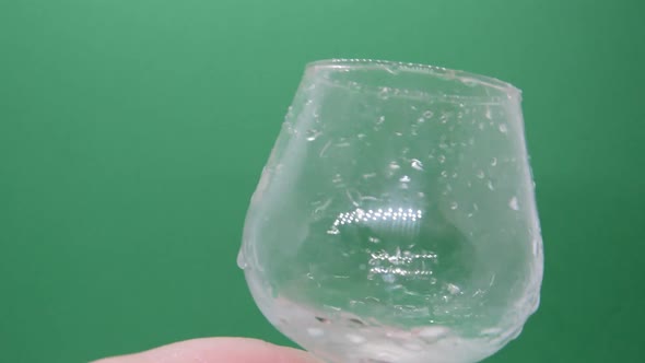 Water or vodka is poured into glasses