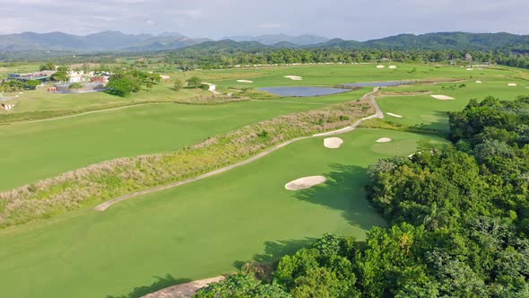 Green Landscape And Bunkers At Vistas Golf Course In Santo Domingo, Dominican Republic. aerial