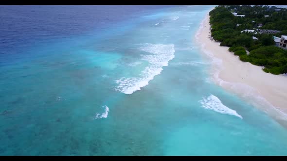 Aerial travel of relaxing resort beach trip by blue sea and white sandy background of a daytrip afte