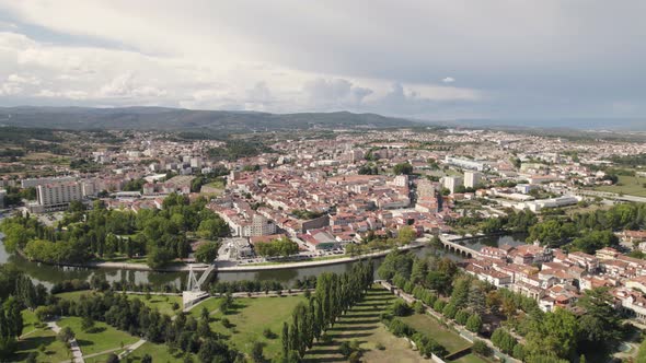 Chaves city and Tamega river in Portugal. Aerial circling