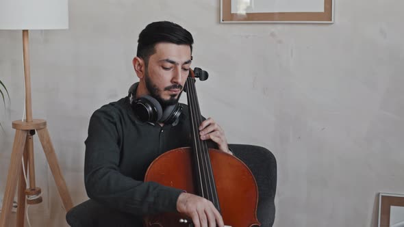 Male Instrumentalist Playing Double Bass