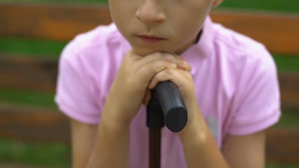 Upset Boy With Cane Feels Lonely, Has No Friends, Difficult Life for Disabled