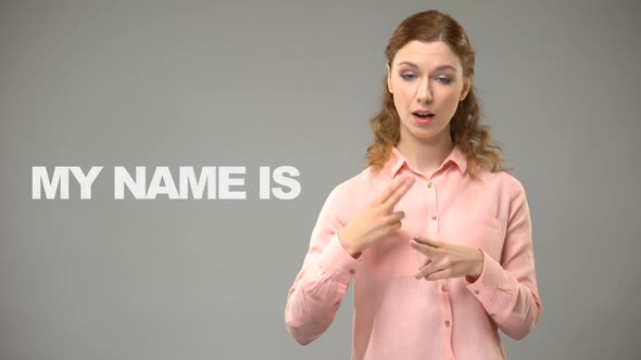 Deaf Lady Saying Nice to Meet You in Sign Language Text on Background Deaf