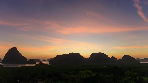 Samet Nangshe viewpoint over Phnag-nga Bay during sunrise, near Phuket, Thailand - Time Lapse