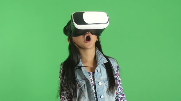 Little Girl Explores Virtual Reality