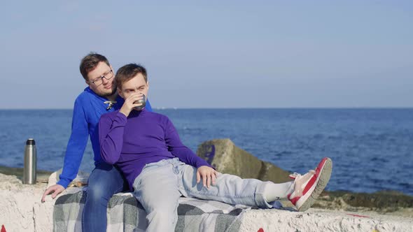 Two Gay Sit at Sea