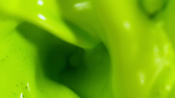 Super Slow Motion Shot of Swirling Green Color Background at 1000Fps