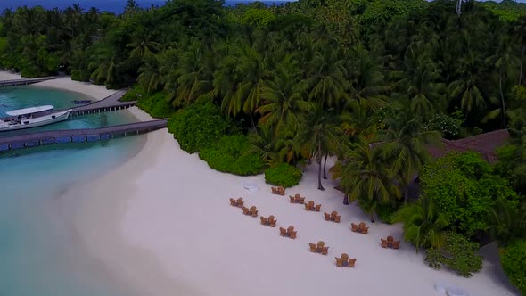 Aerial drone seascape of tropical bay beach journey by blue lagoon and sand background