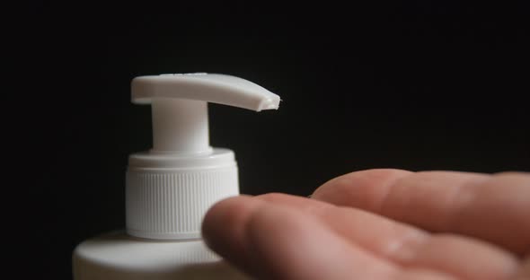 Hand cream slow motion in studio