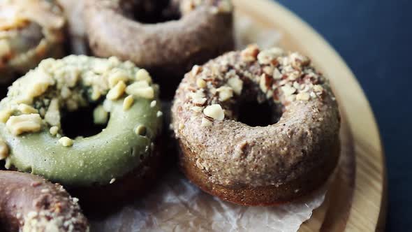 Set of glazed donuts for lunch in pastry cafe