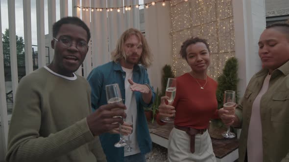 Friends with Flutes Dancing at Rooftop Party