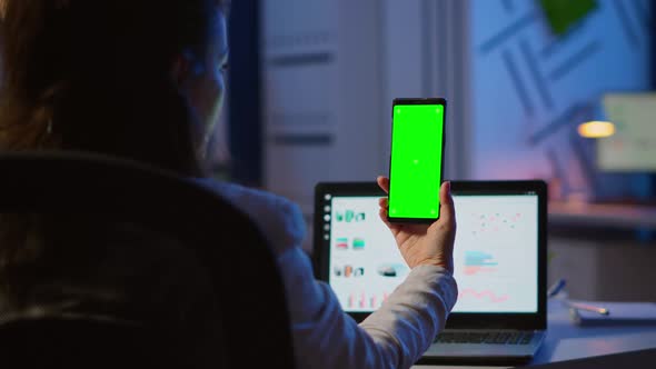 Woman Employee Looking at Smartphone with Chroma Key