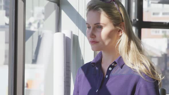 Businesswoman looking away in modern office