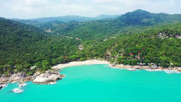 Daytime drone copy space shot of a paradise sunny white sand beach and aqua turquoise water backgrou