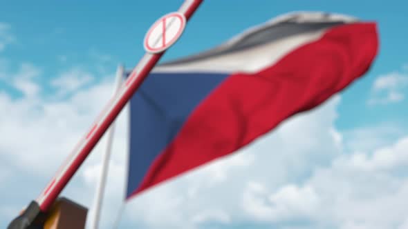 Closing Boom Barrier with STOP CORONAVIRUS Sign Against the Czech Flag alt
