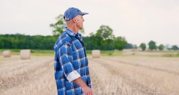 Agriculture Farmer Working on Field on Digital Tablet Computer