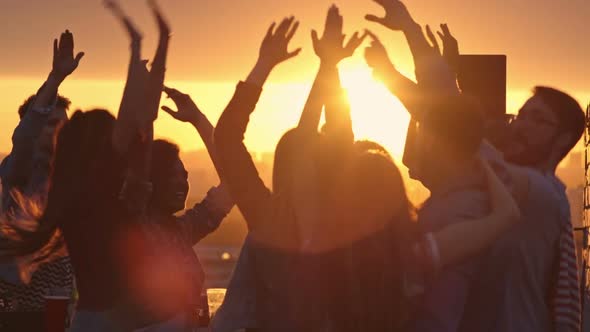 Partying on Rooftop at Sunset