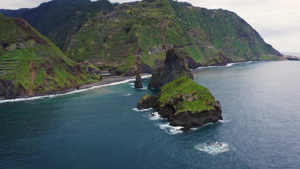 Flying Around Ribeira Da Janela Volcanic Sea Stacks in Madeira Island Portugal