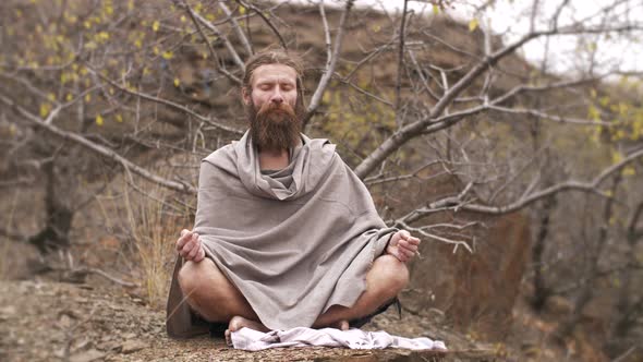 Yogi Asket Meditating on Nature