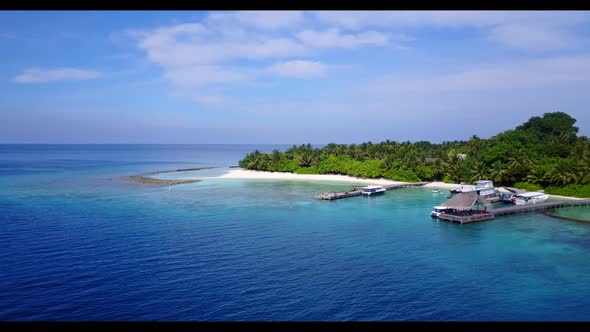 Aerial top down travel of paradise lagoon beach holiday by blue sea with white sand background of a 