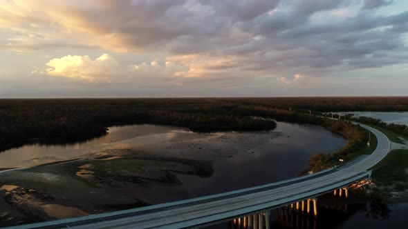 Sunset at the Goodland Bay Bridge in Marco Island, Florida.