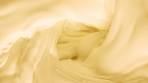 Super Slow Motion Shot of Swirling Yellow Milky Wortex at 1000Fps