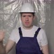 Builder in Blue Overalls Puts on White Hard Hat Helmet - VideoHive Item for Sale