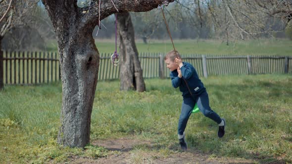 Children Playing Family Parent Holidays Relationship With Kid Swing Ride.Happy Family Child Game Boy