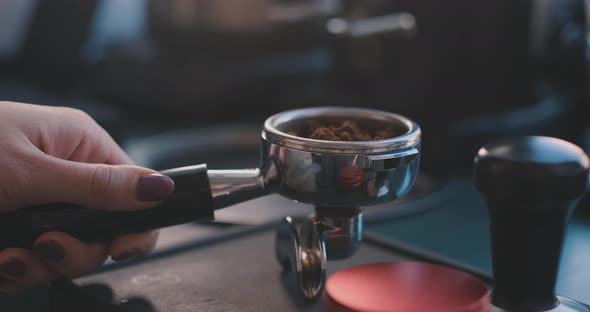 Making Ground Coffee with Tamping Fresh Coffee. Close-Up. Making Coffee From Start To finish.Tamping