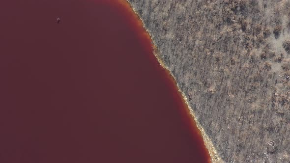 Above the deposits of pyrite and red acid mine drainage waters 4K drone video