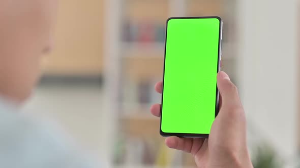 Chroma Key Young African American Man Using Green Smartphone Screen