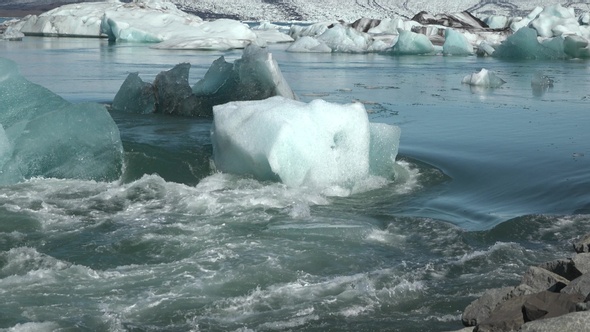Climate change. Global warming is leading to the melting of glaciers in the Arctic and Antarctic.