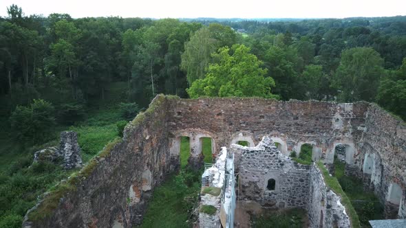 Medieval Castle Ruins in Latvia Rauna. Aerial View Over Old Stoune Brick Wall of Raunas Castle 