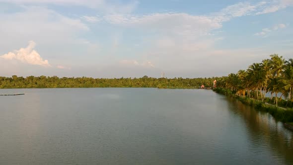 Vembanad lake fish farm,aerial shot,coconut tree lines