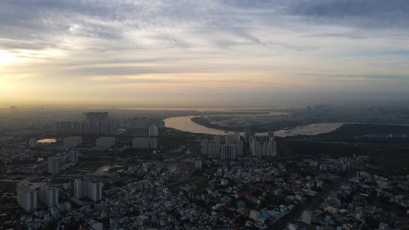 Aerial view overlooking the Binh Khanh and the Saigon river, foggy, sunset in Ho chi minh, Vietnam -