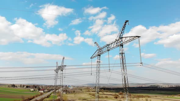 Aerial View Long-distance Power Transmission Lines. High-voltage Poles That Efficiently Transmit