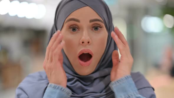 Close Up of Young Woman with Shocked Expression