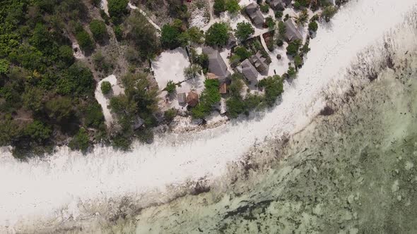 Vertical Video of Low Tide in the Ocean Near the Coast of Zanzibar Tanzania Aerial View