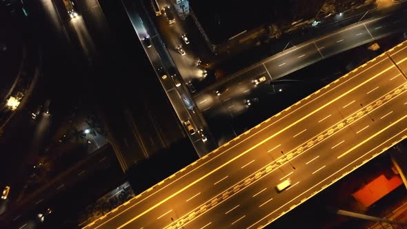 Closeup Aerial Top Down: Cars Ride at Night Traffic Road. Philippines Cityscape, Vehicles at Highway