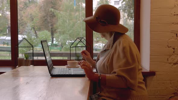 Elderly Woman with Laptop